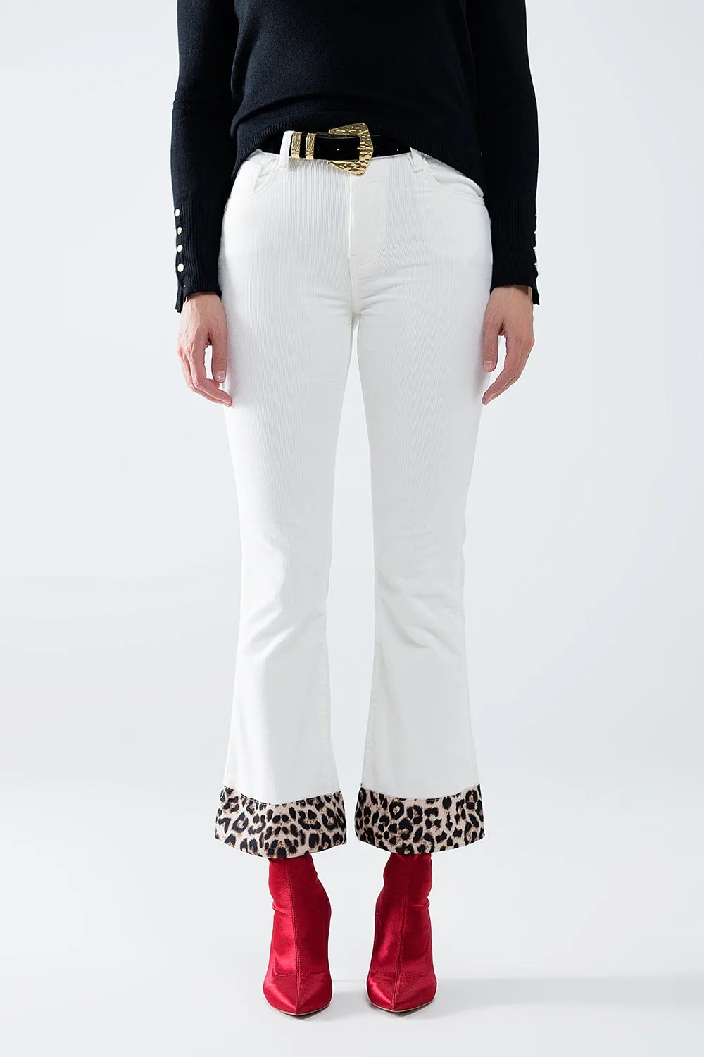 Cream Corduroy flare pants with leopard print at the bottom