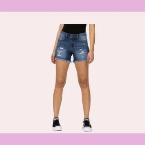 Dark denim cut off shorts with distressed detail and a raw hem